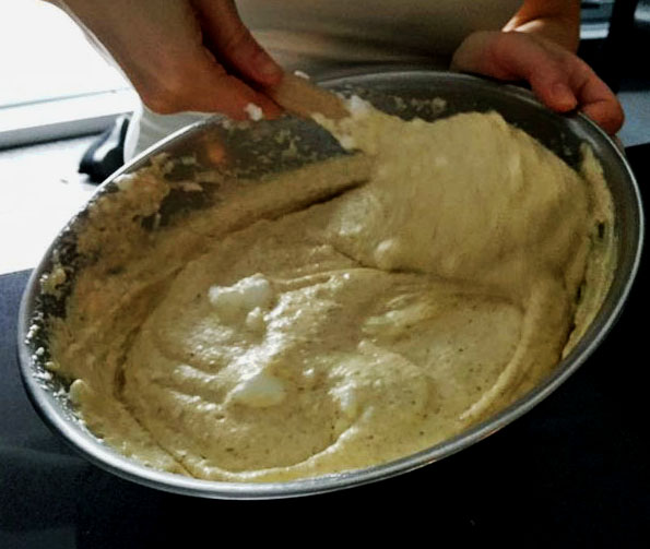 Folding egg whites into walnut batter - My Cookbook Addiction